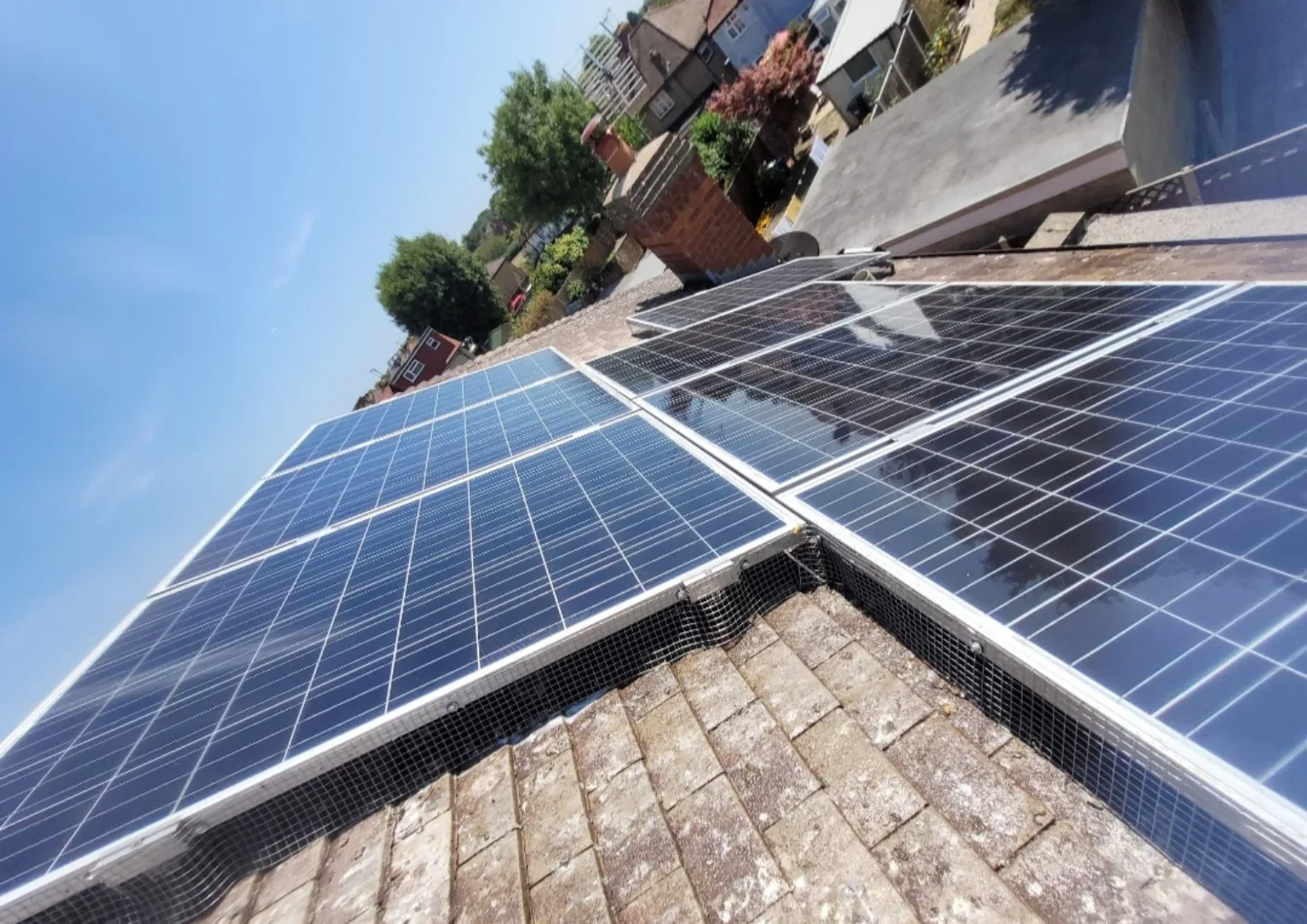 Solar panel mesh installation on residential roof